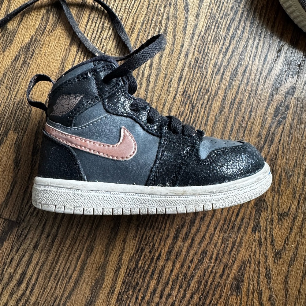 Nike Black and Pink Sneakers with Metallic Swoosh